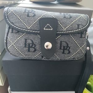 Authentic Dooney & Bourke Flap Wristlet